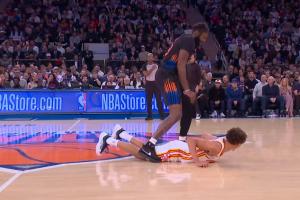 这显着居心的！米切罗掩护推倒丹尼尔斯 然后跨人越事后者头顶吃T_24直播网